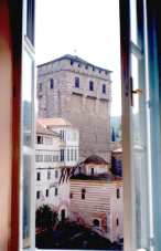 a look through window of a guest room