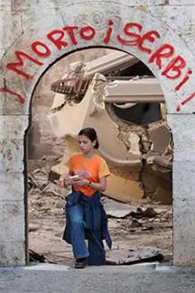 Burnt Church with an encription "Death to Serbs" in Albanian